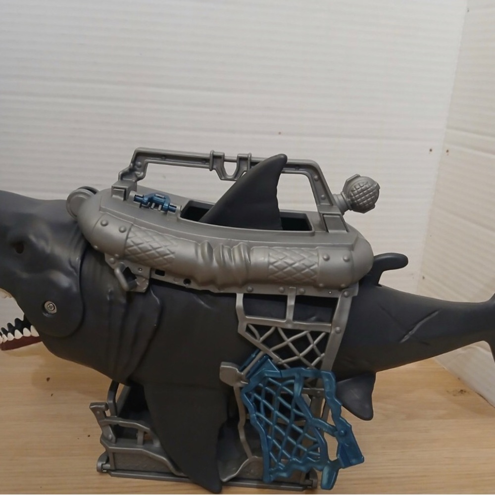 Motorized chomping shark toy. Age 3 plus